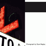 Colonial Photo & Hobby at night, 644 N. Mills
